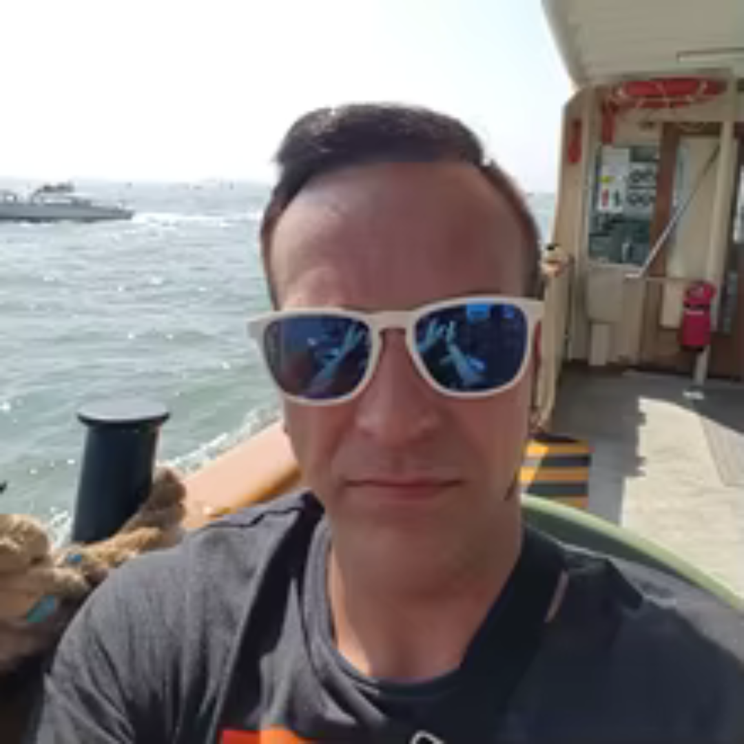 <em><strong>John Miller</strong></em>